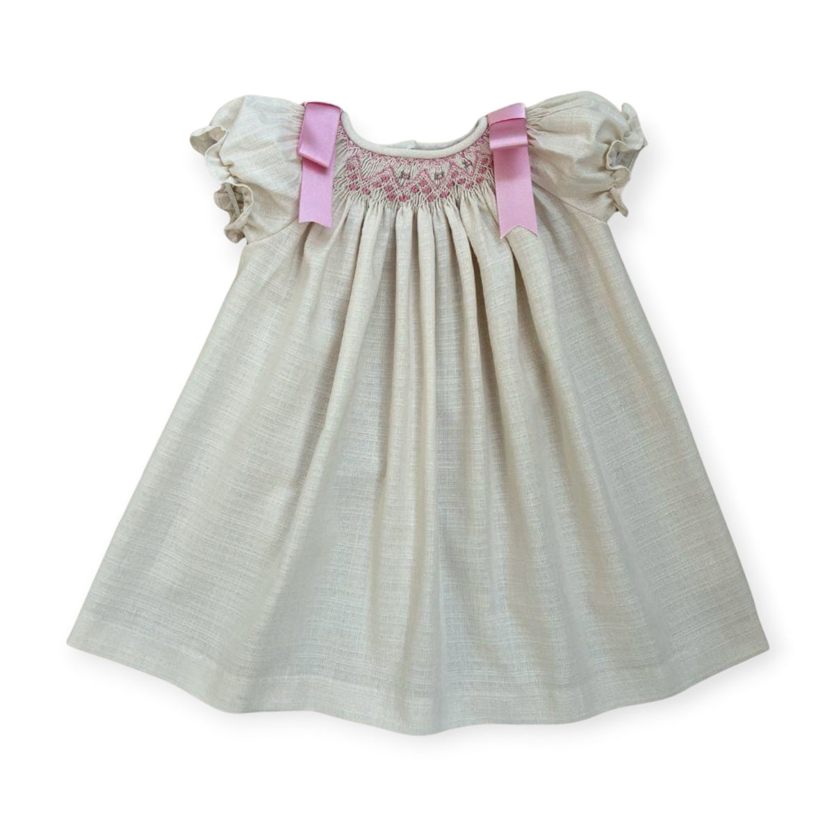 Caterina Beige Handsmocked Bishop Girl Dress with pink shoulder bows and smocked neckline