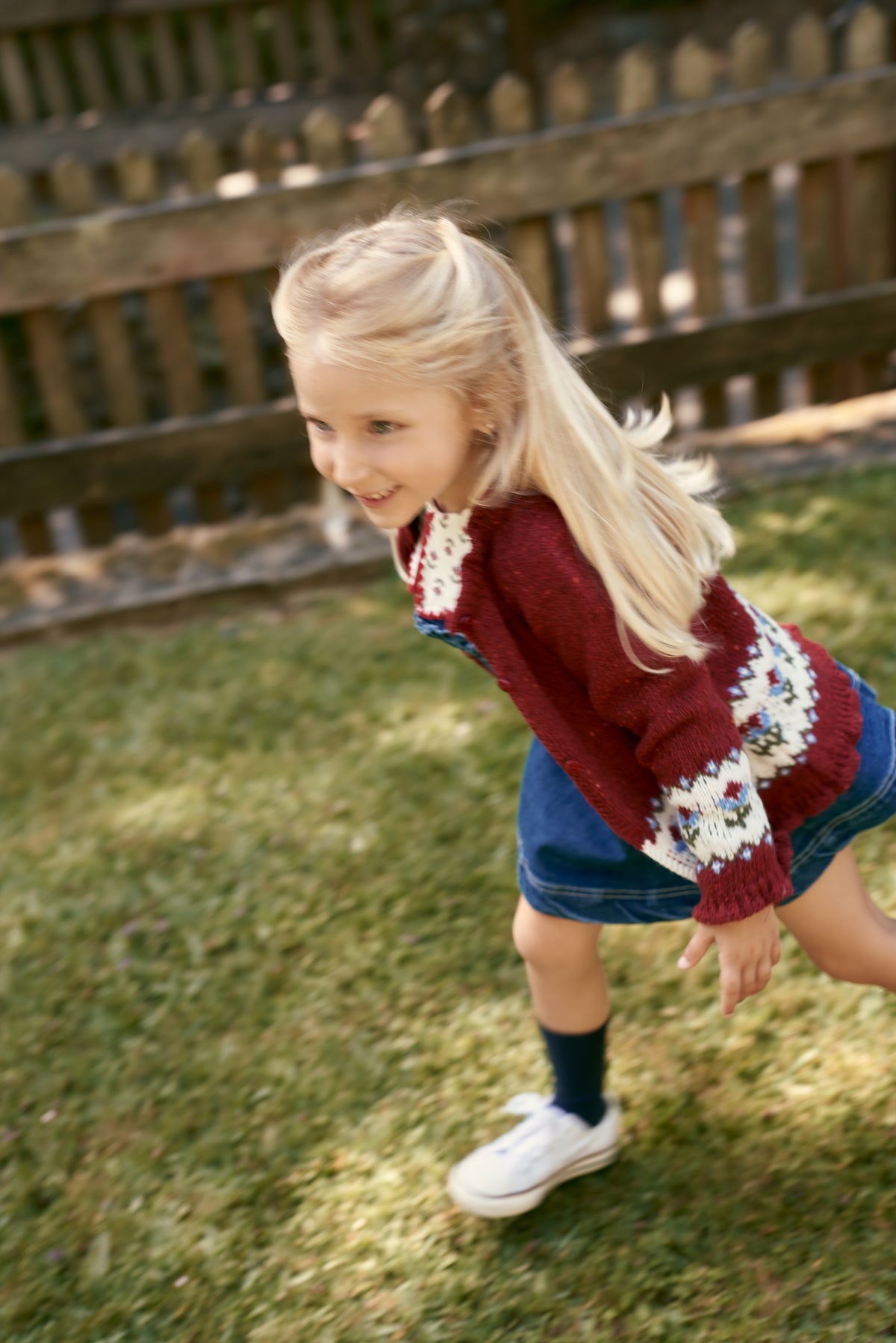 Girl wearing burgundy Floral Girl Knitted Cardigan