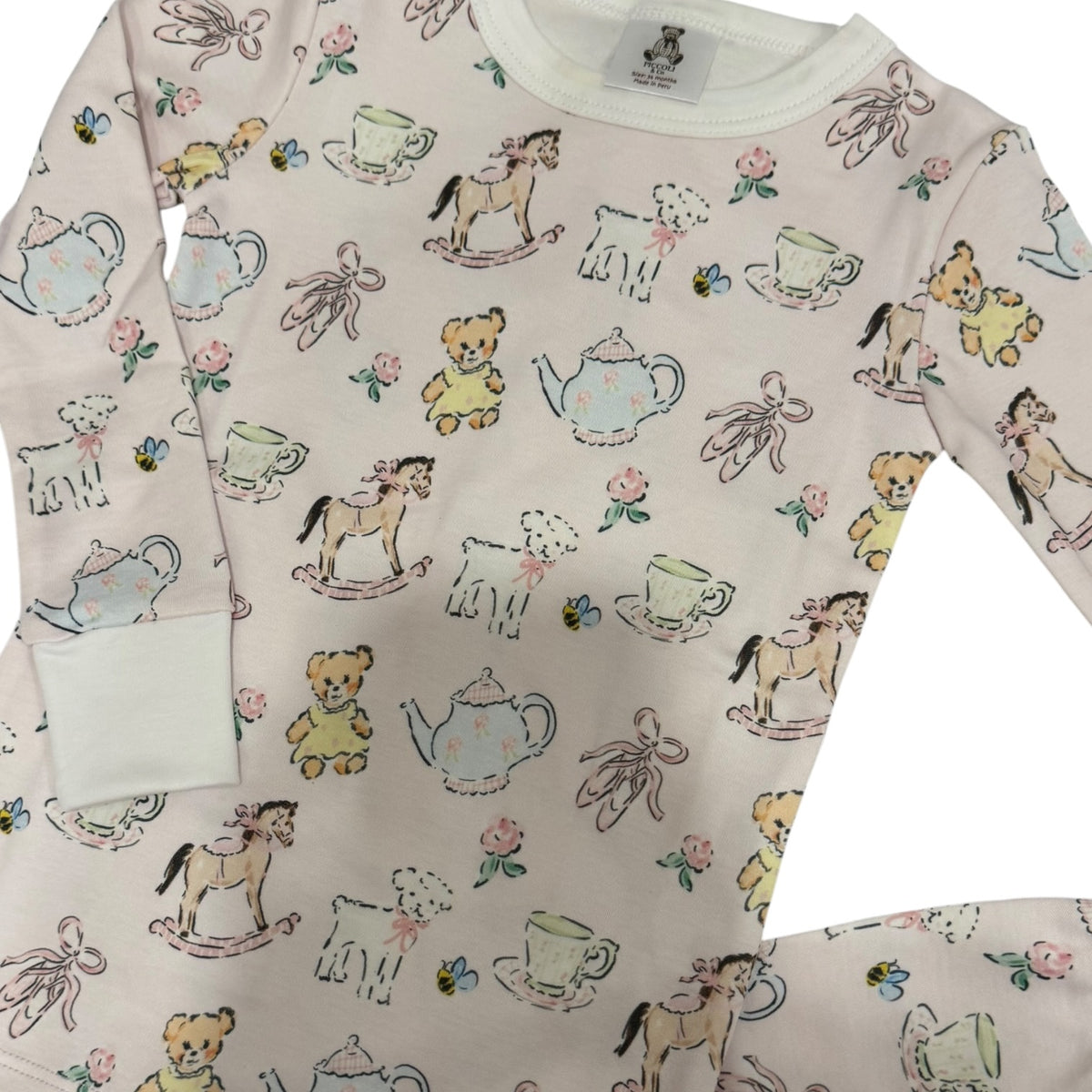 Close-up of whimsical pink and neutral print on Thank Heaven for Little Girls Pajamas