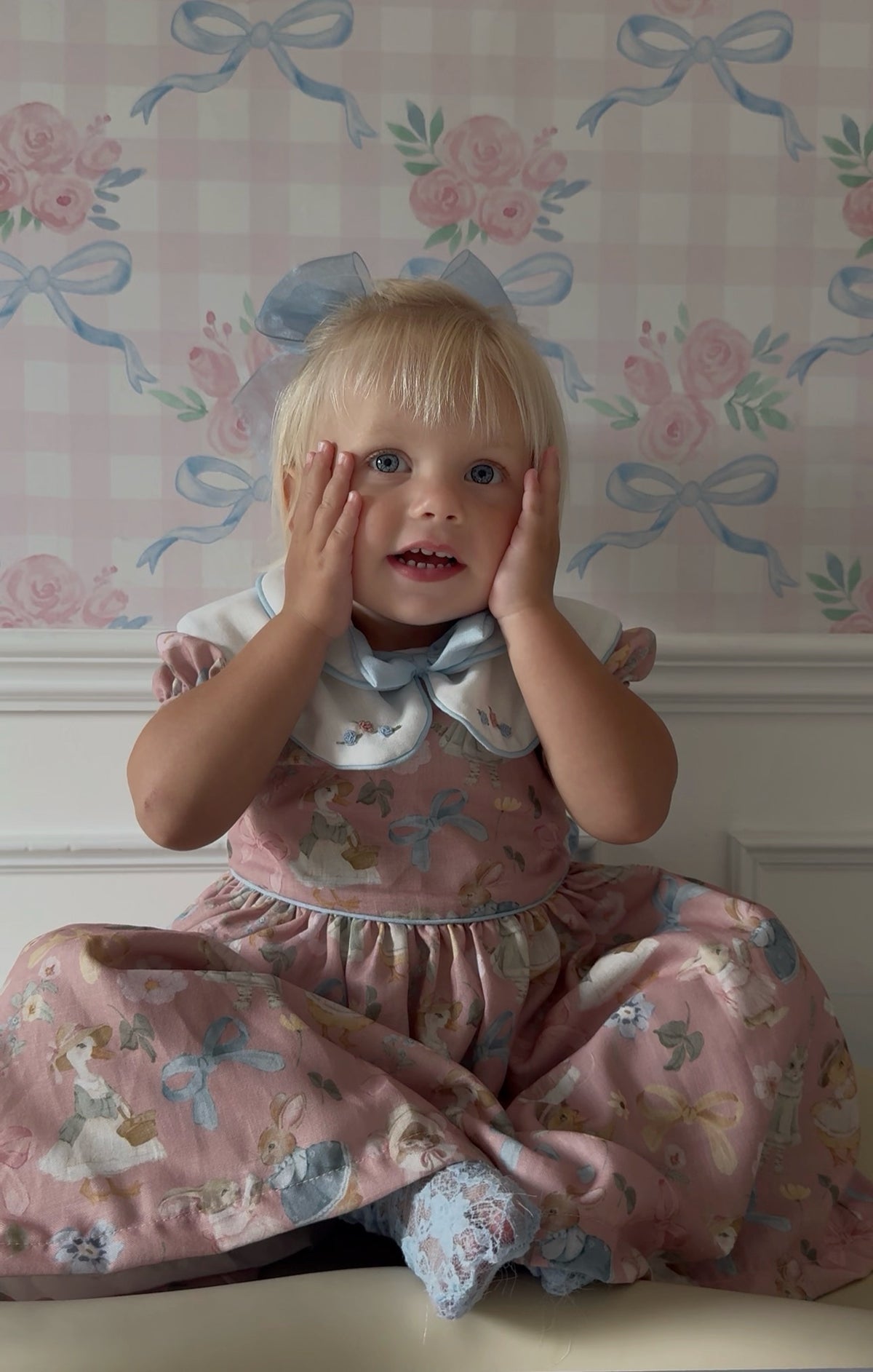 Girl wearing Karla Whimsy Animals Garden Dress