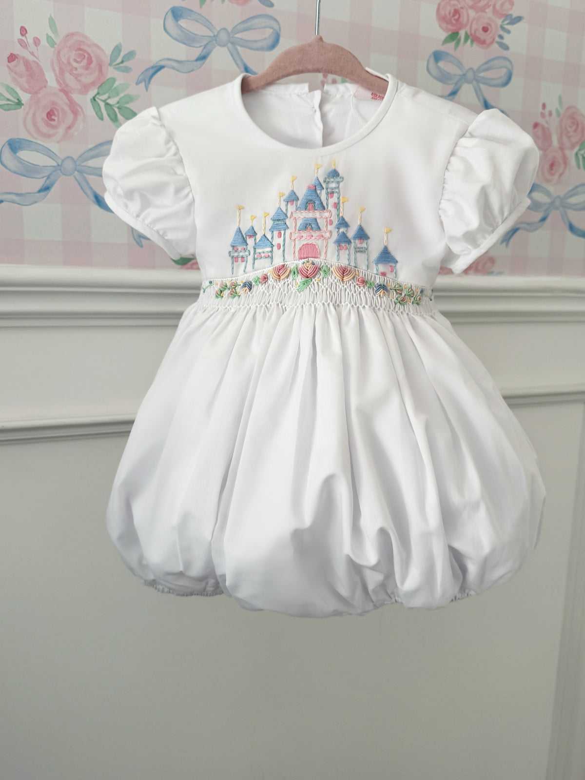 Front view of Once Upon a Time White Handsmocked Romper
