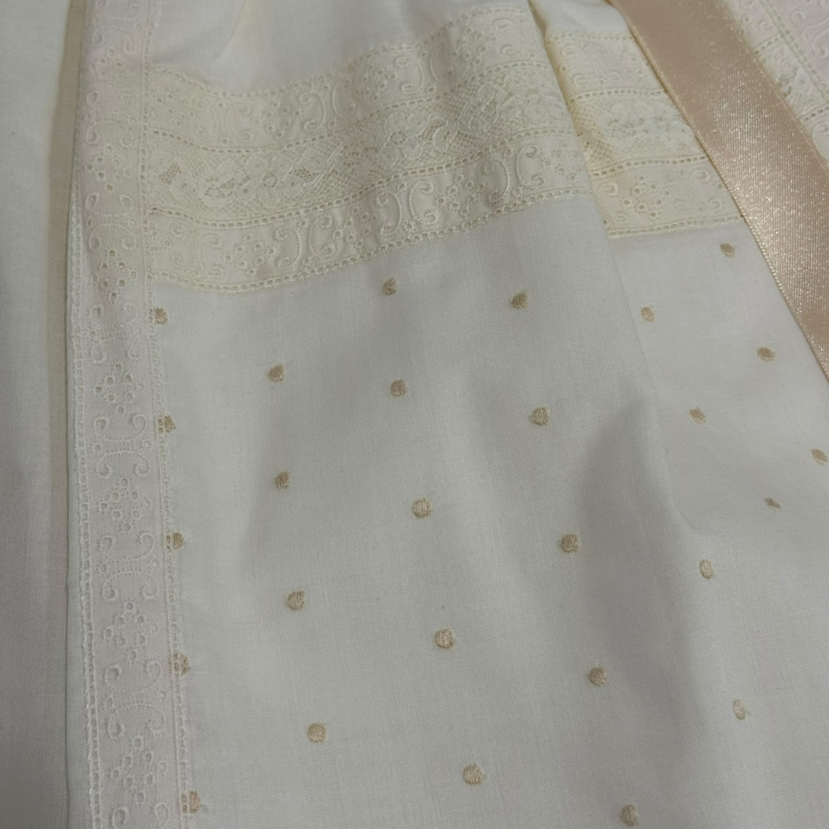 Close-up of delicate tonal embroidery on Gabriel Ivory and Beige Lace Faldon Skirt