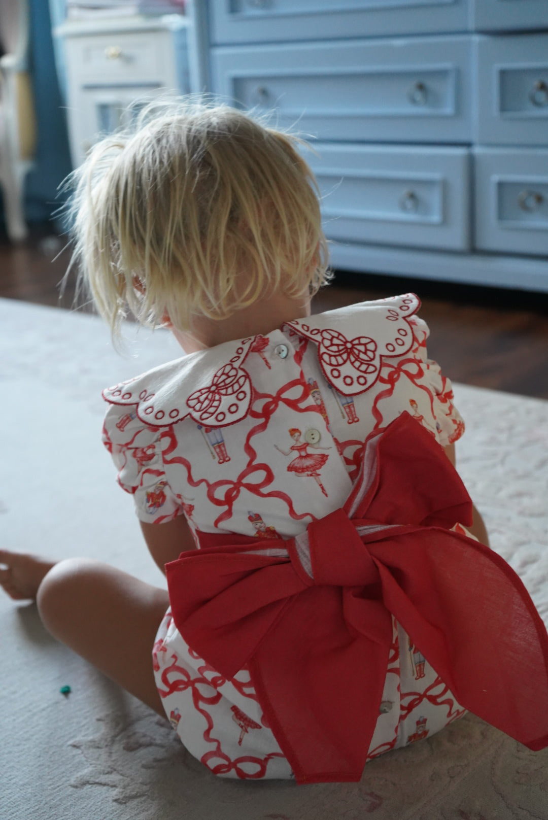 Back view of Nutcracker Red Girl Bubble in red and ivory 2