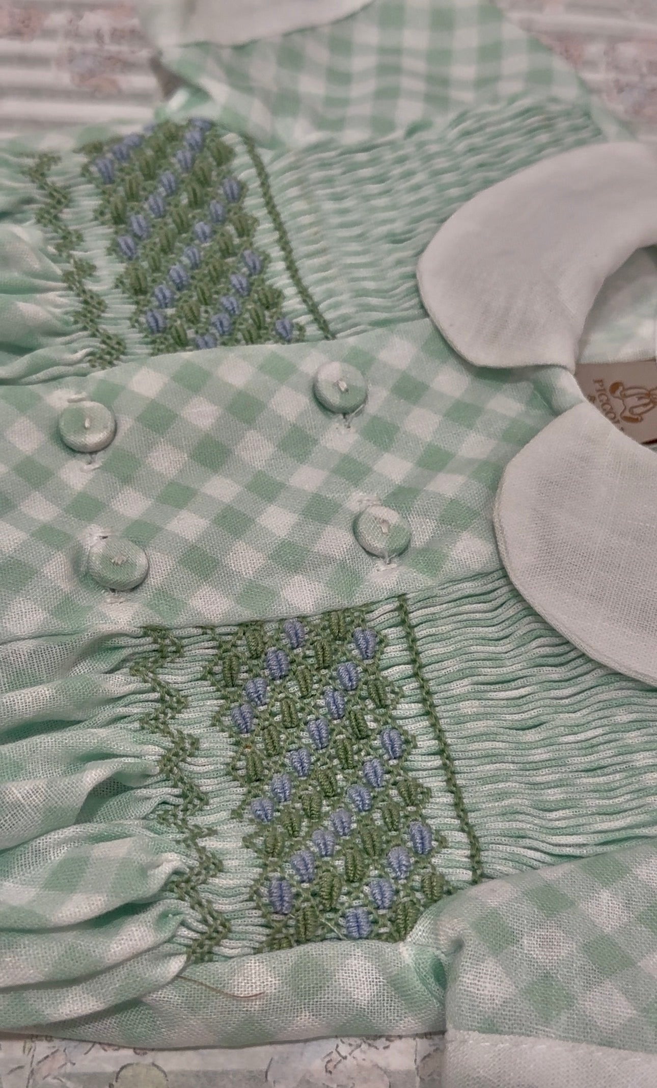 Close-up of handsmocking on Joe Boy Gingham shirt