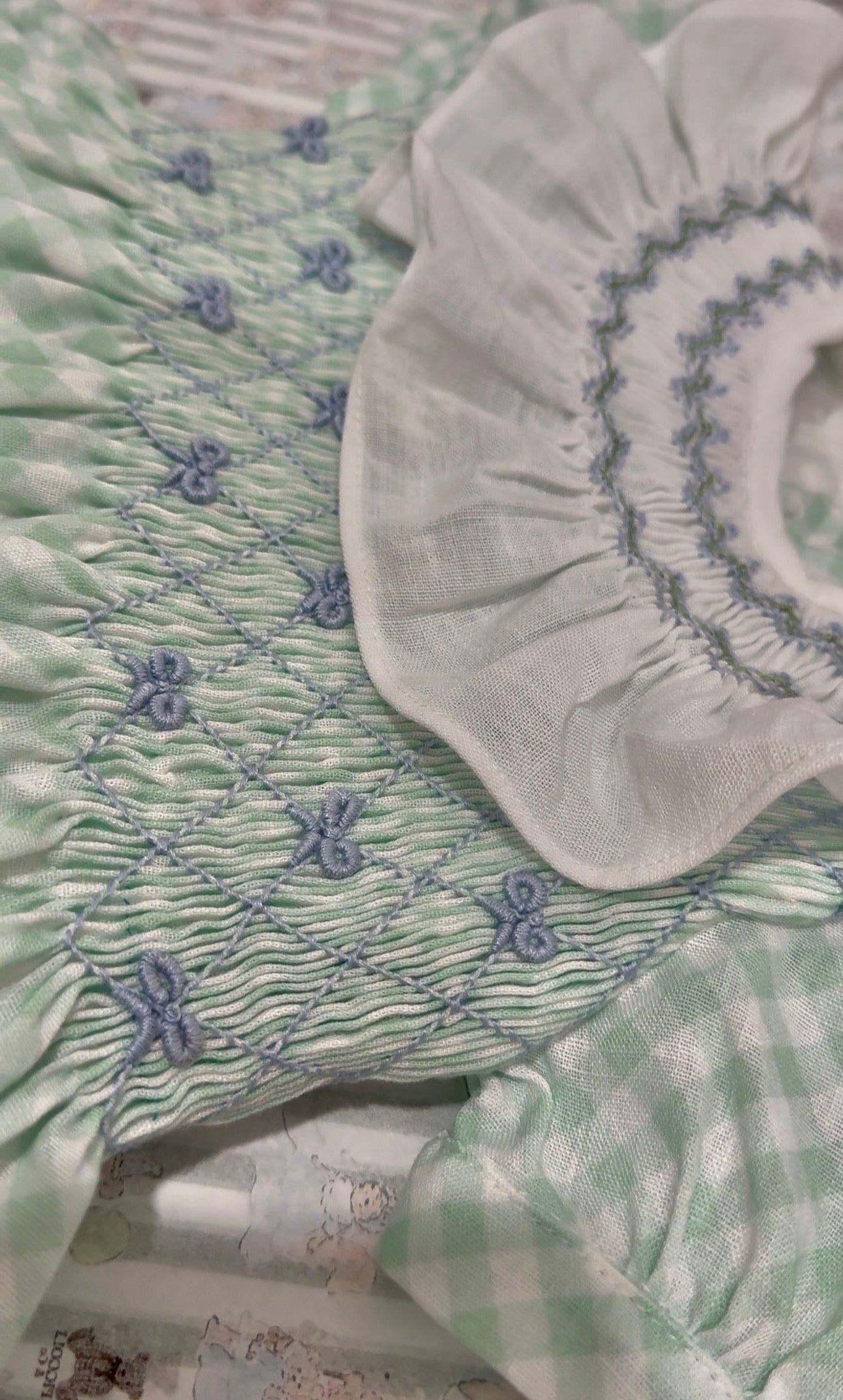 Close-up of handsmocking and ruffled neckline on Joe Green Gingham Dress