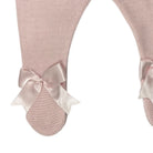 Close-up of pink satin bow detailing on Aida Knitted Pants