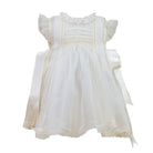 Regina Luxe Ivory Handsmocked Dress with lace detailing and satin side bows