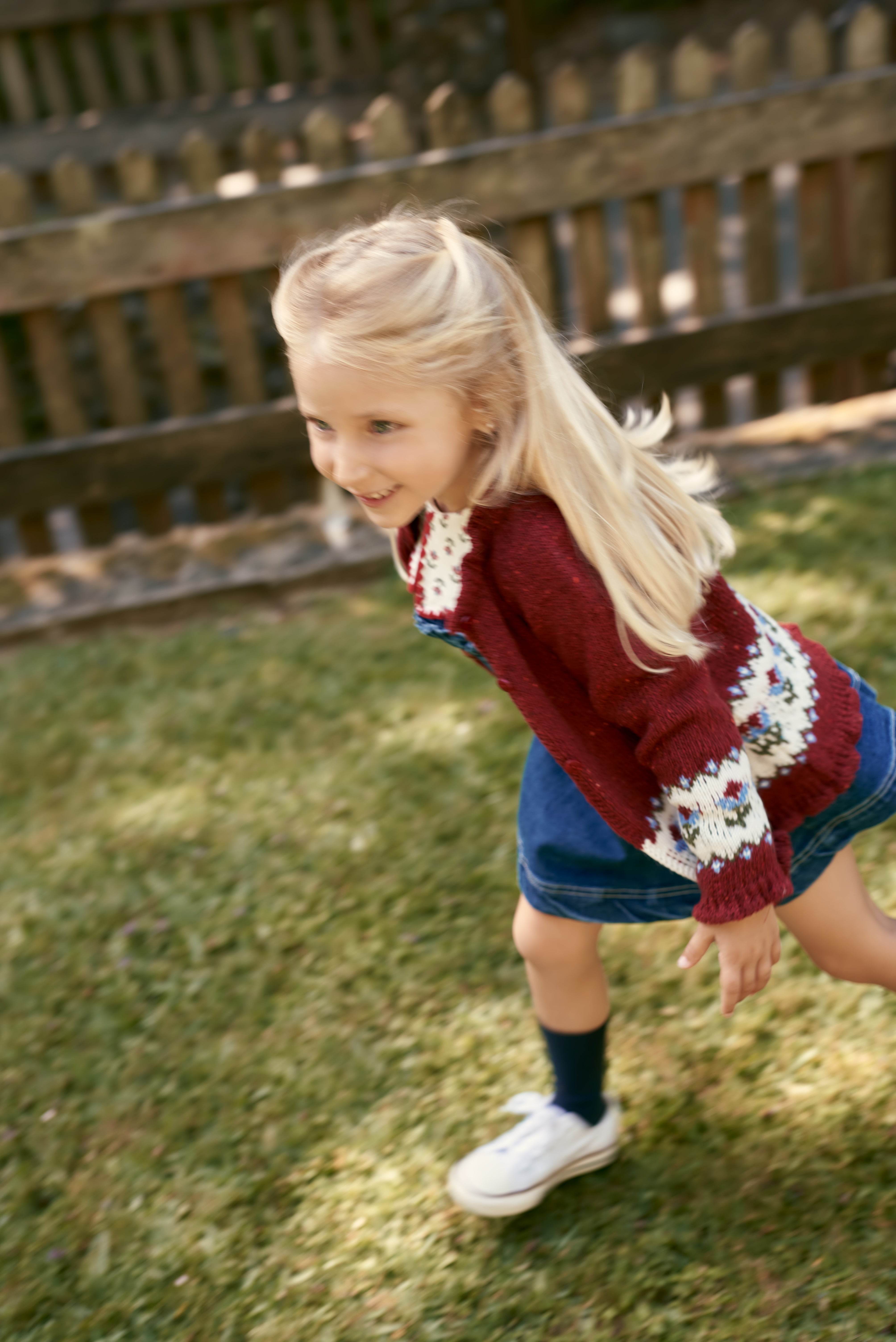 Girl wearing burgundy Floral Girl Knitted Cardigan