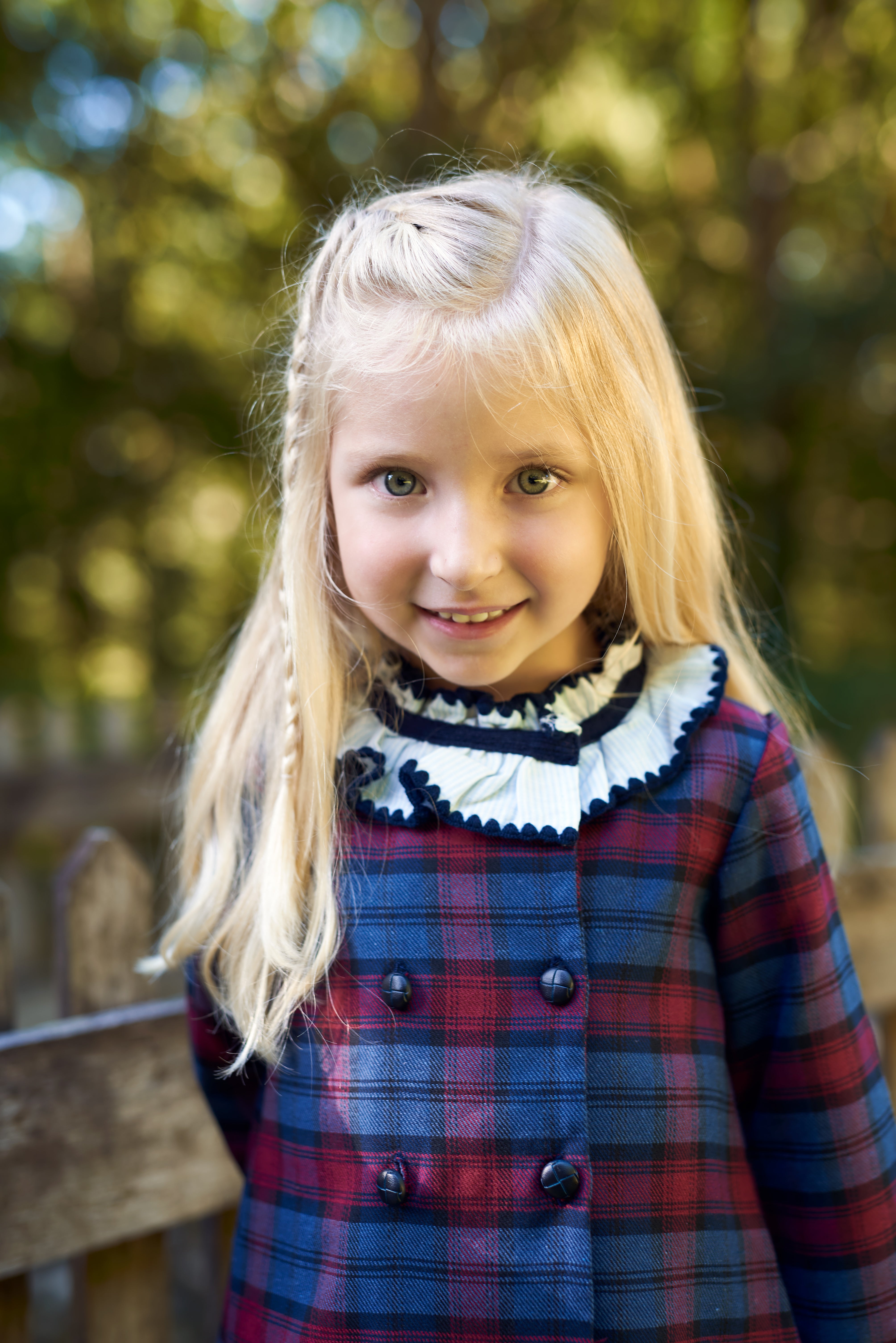 Girl wearing Louis Tartan Navy Blue and Burgundy Dress