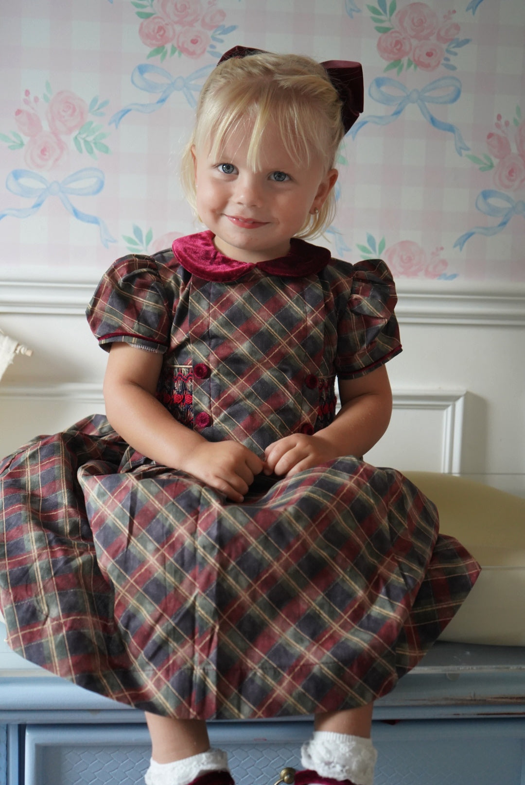 Girl wearing Tartan Luxe Handsmocked Christmas Dress 2