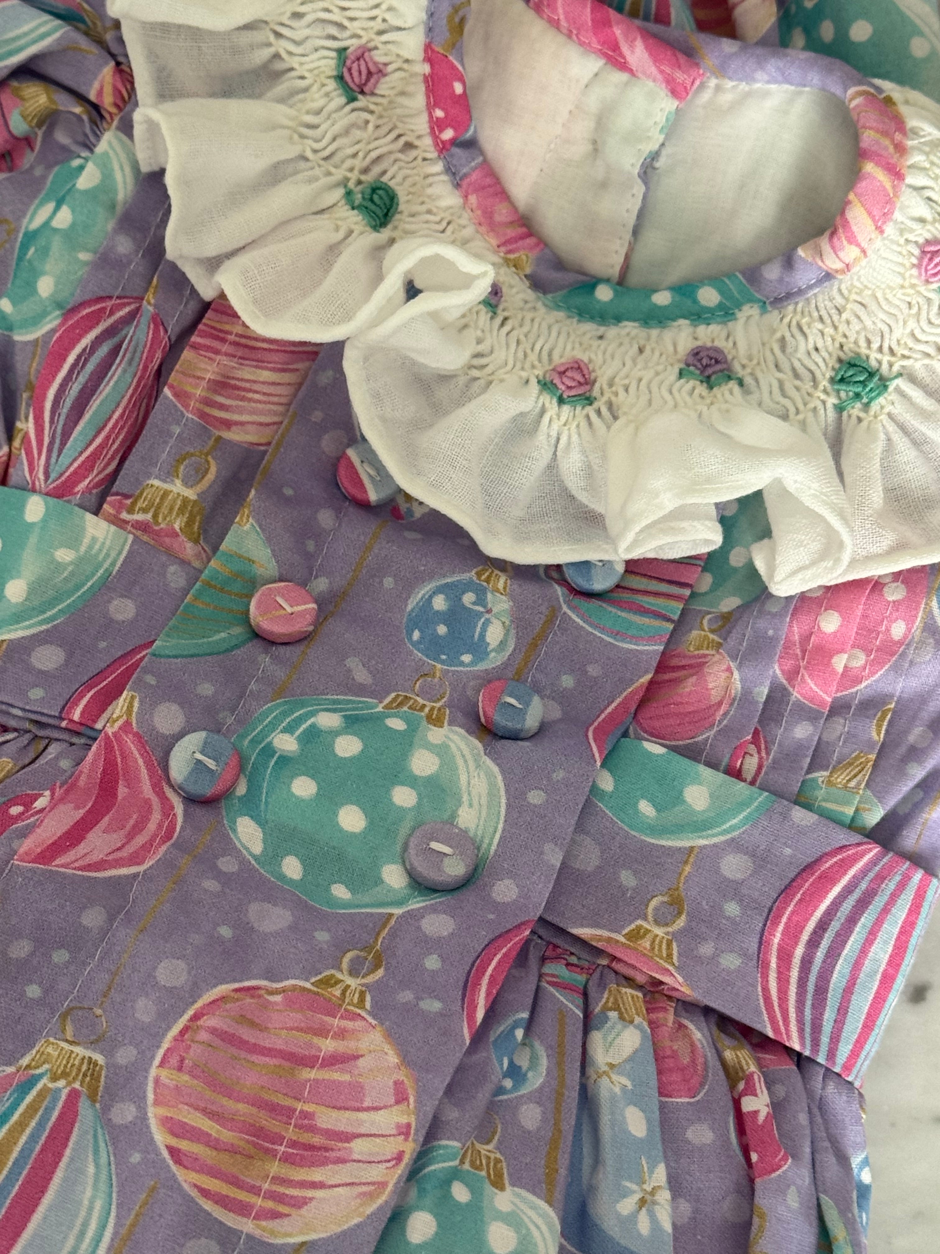 Close-up of colorful handsmocking and embroidered collar accents on Gigi Ornaments Pastels 