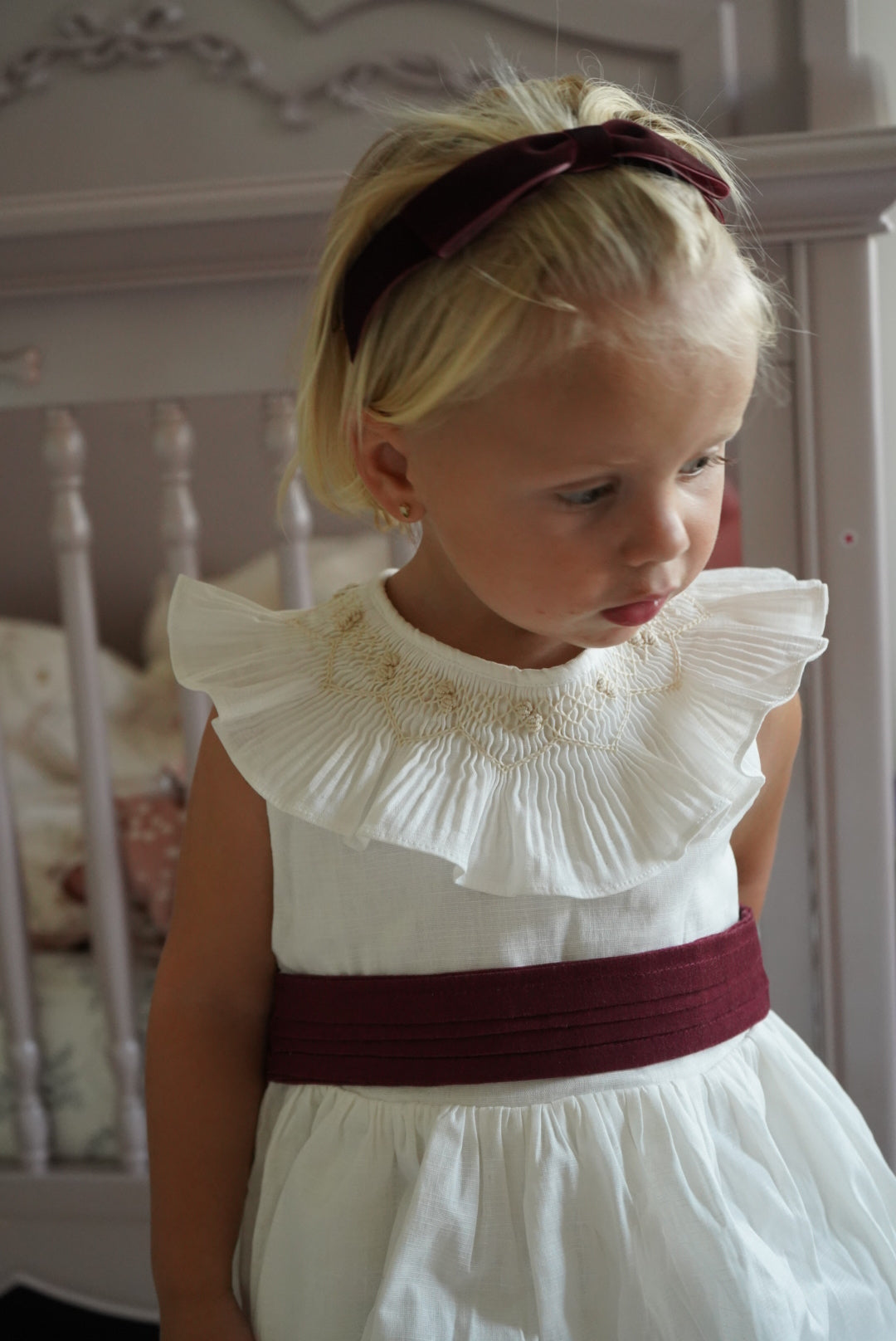 Girl wearing TPWC Flower Girl Dress with burgundy accents 2