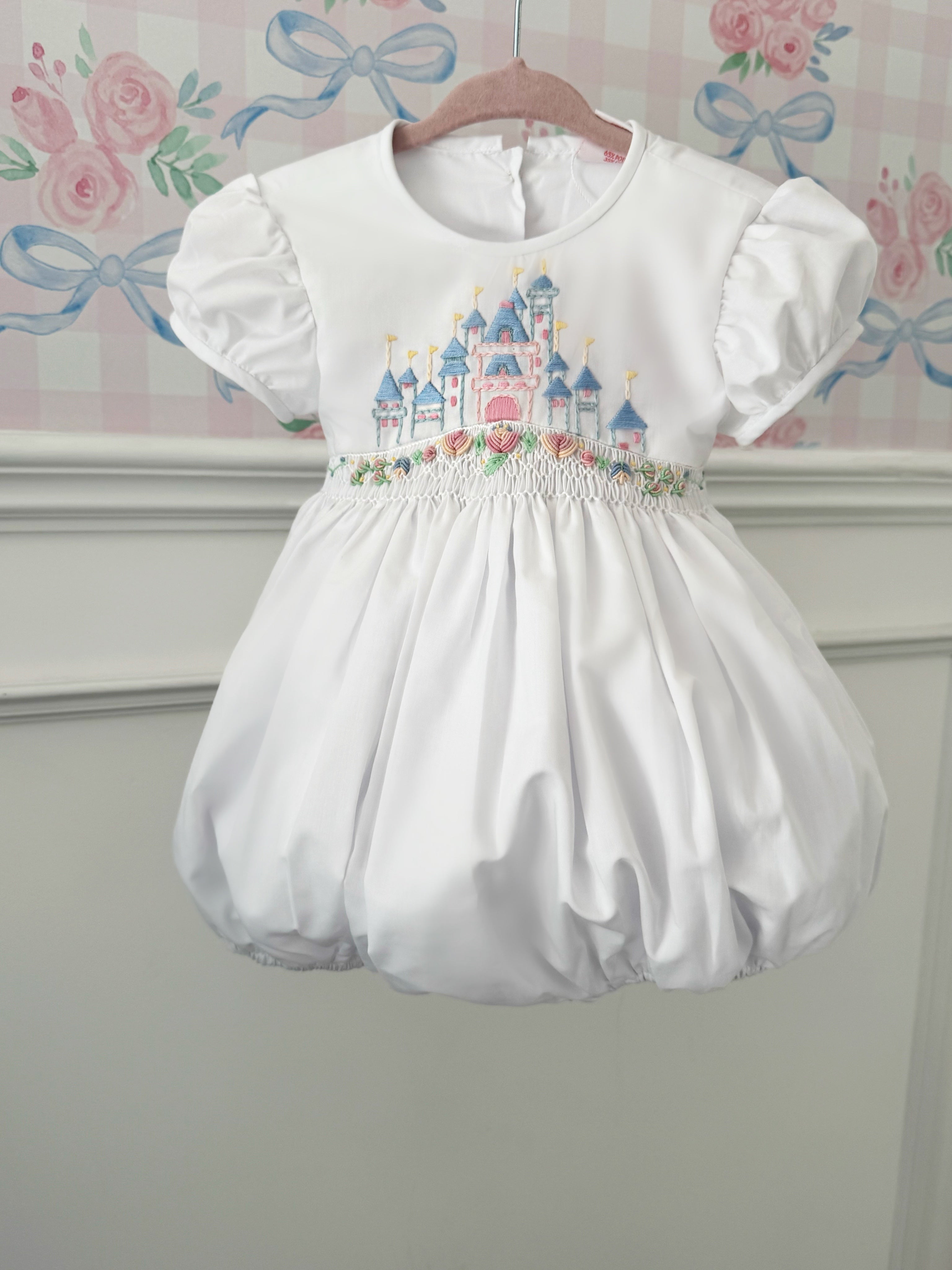 Front view of Once Upon a Time White Handsmocked Romper