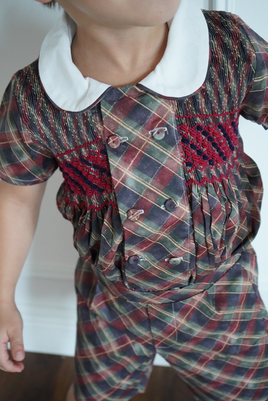 Boy wearing Tartan Luxe Christmas Handsmocked Set
