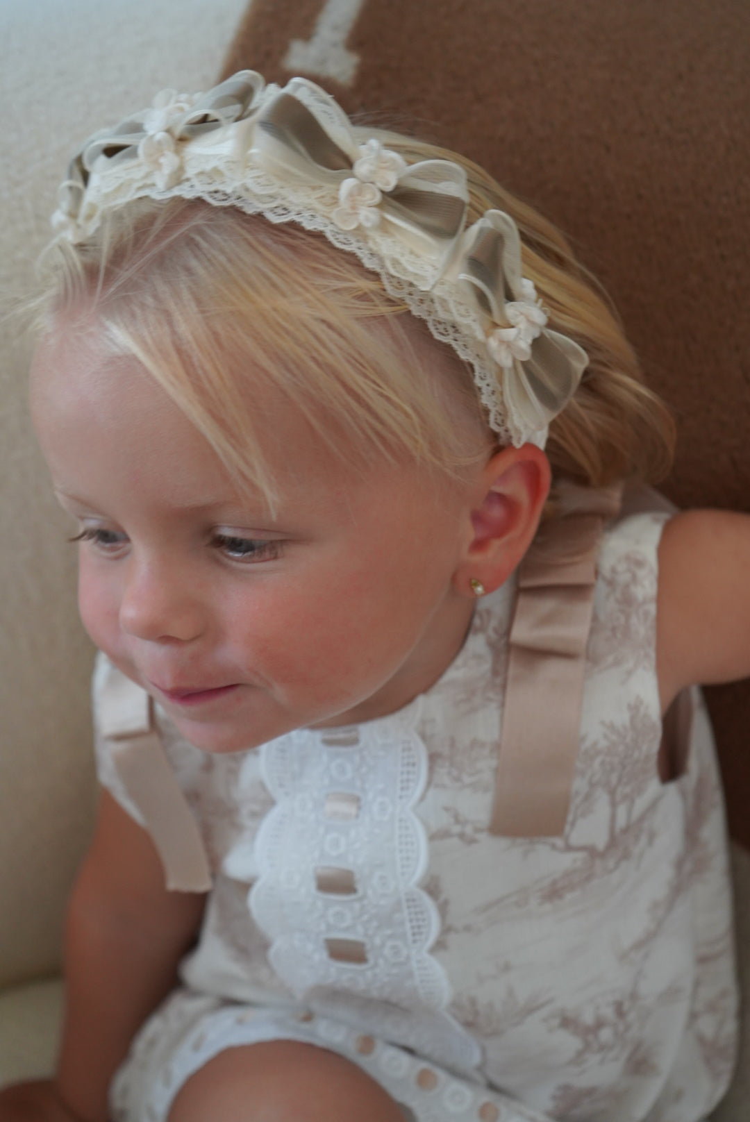 Girl wearing TPWC Taupe Organza Handmade Flowers Headband