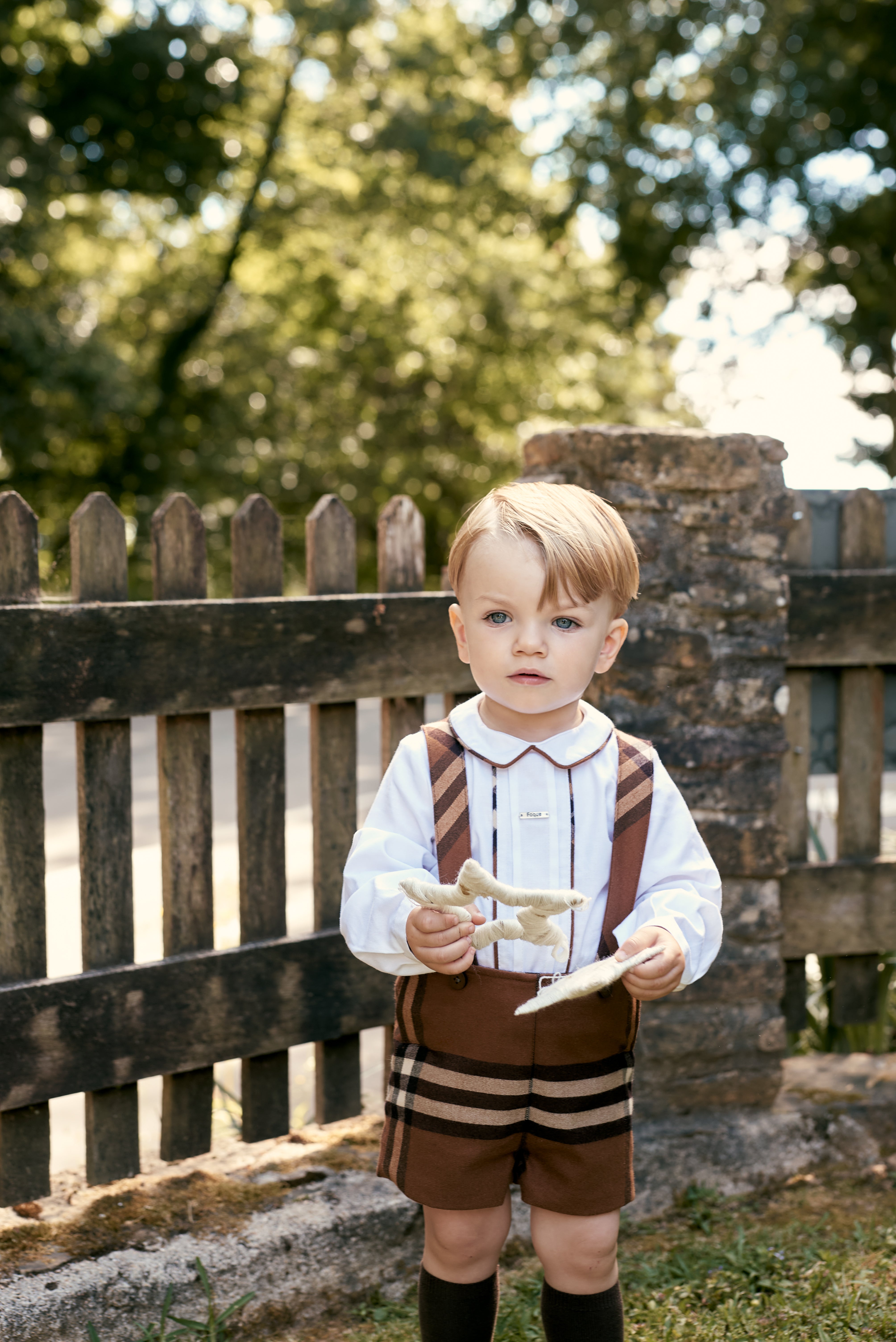 Boy wearing Verbier Brown 2-Piece Romper Set