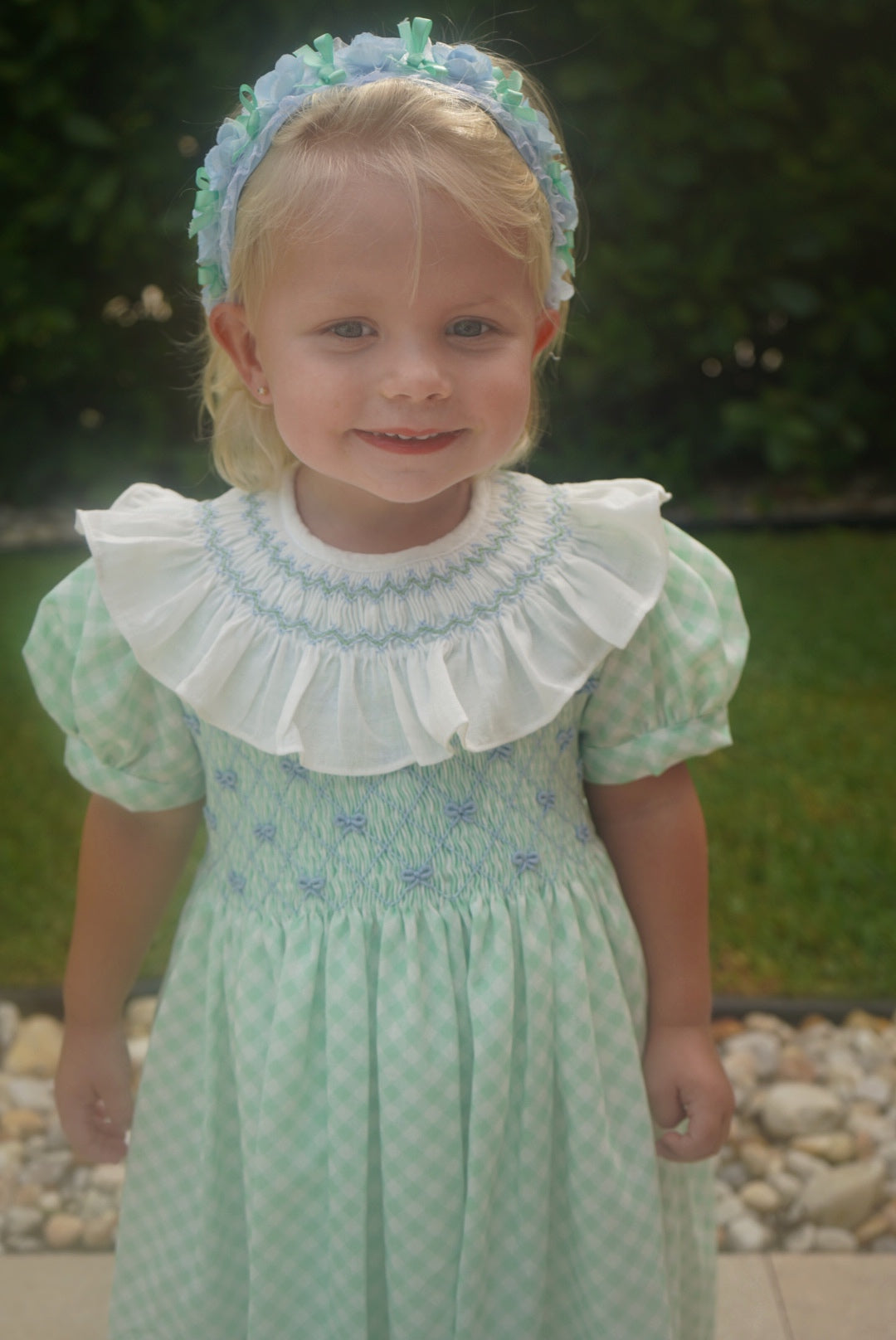 Girl wearing Joe Green Gingham Handsmocked Dress